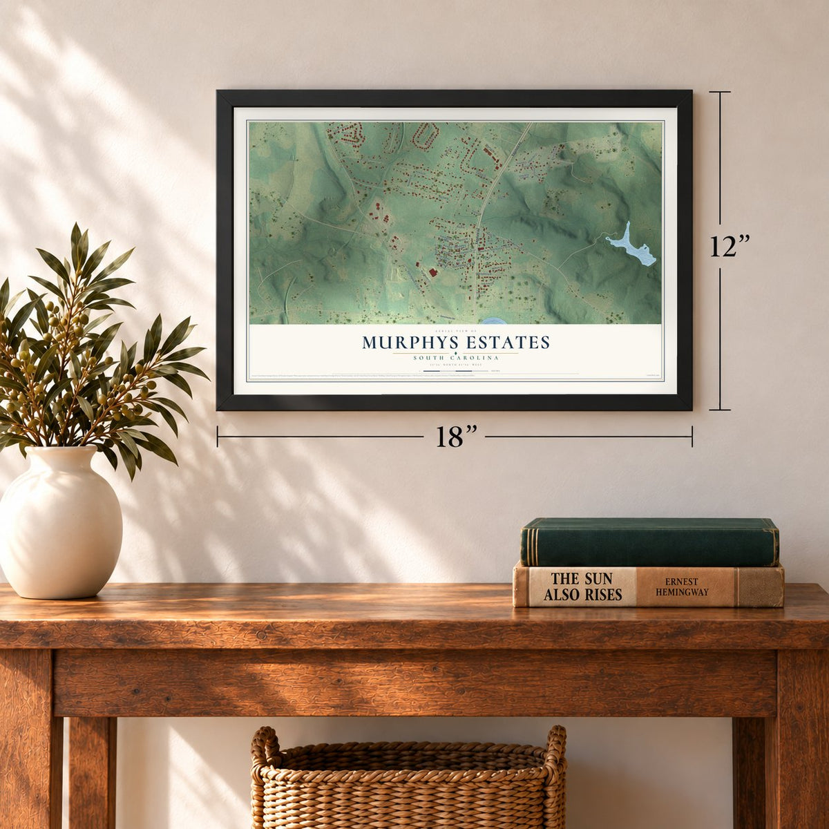 Murphys Estates, South Carolina map, 12 x 18 inch print in a black frame in an entryway