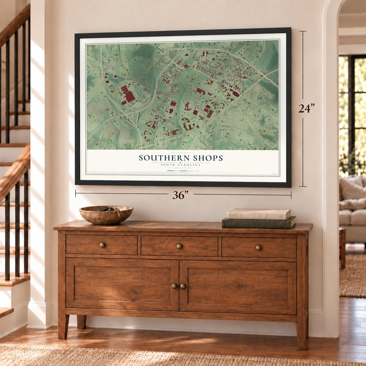 Southern Shops, South Carolina map, 24 x 36 inch print in a black frame above a dresser by a staircase