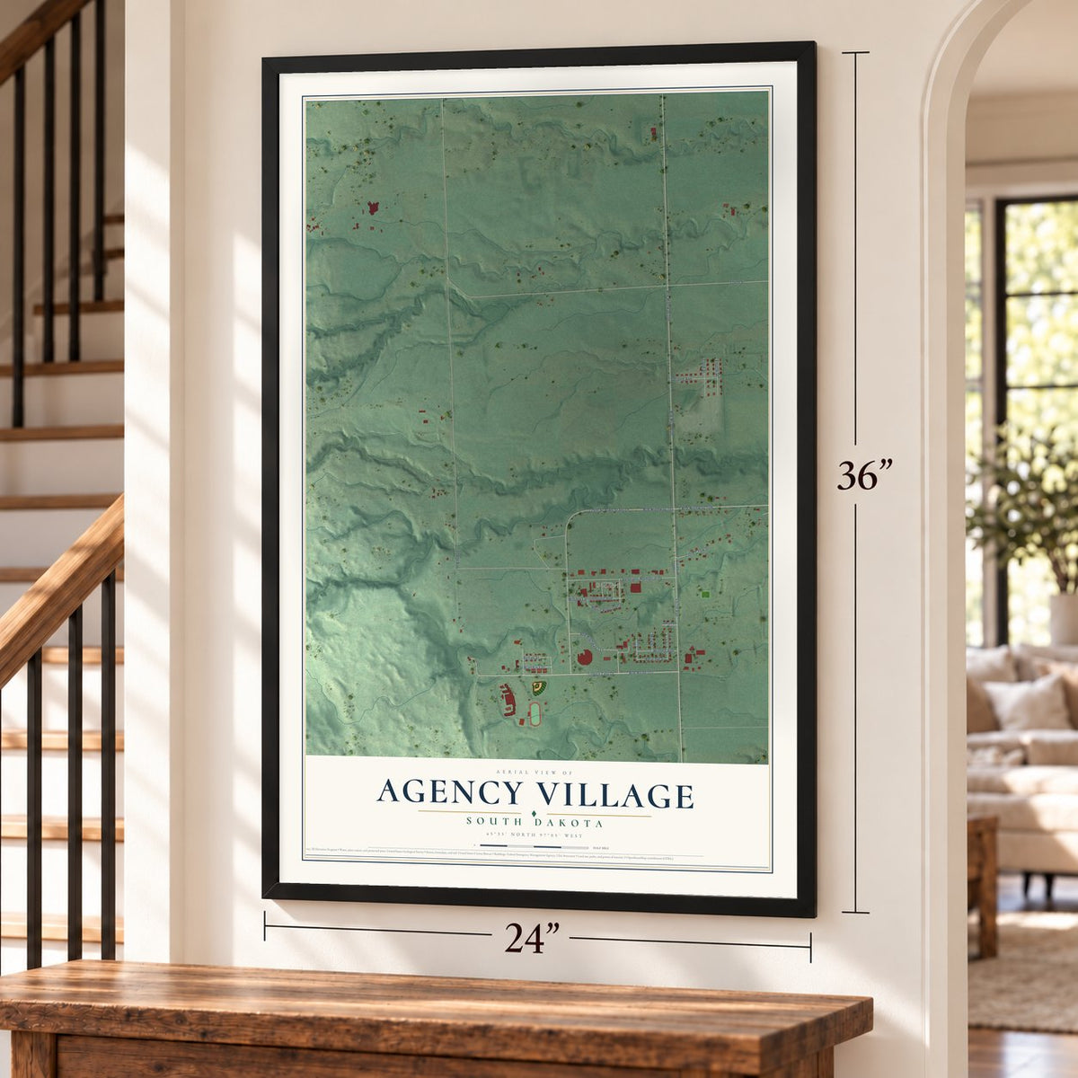 Agency Village, South Dakota map, 24 x 36 inch print in a black frame by a staircase