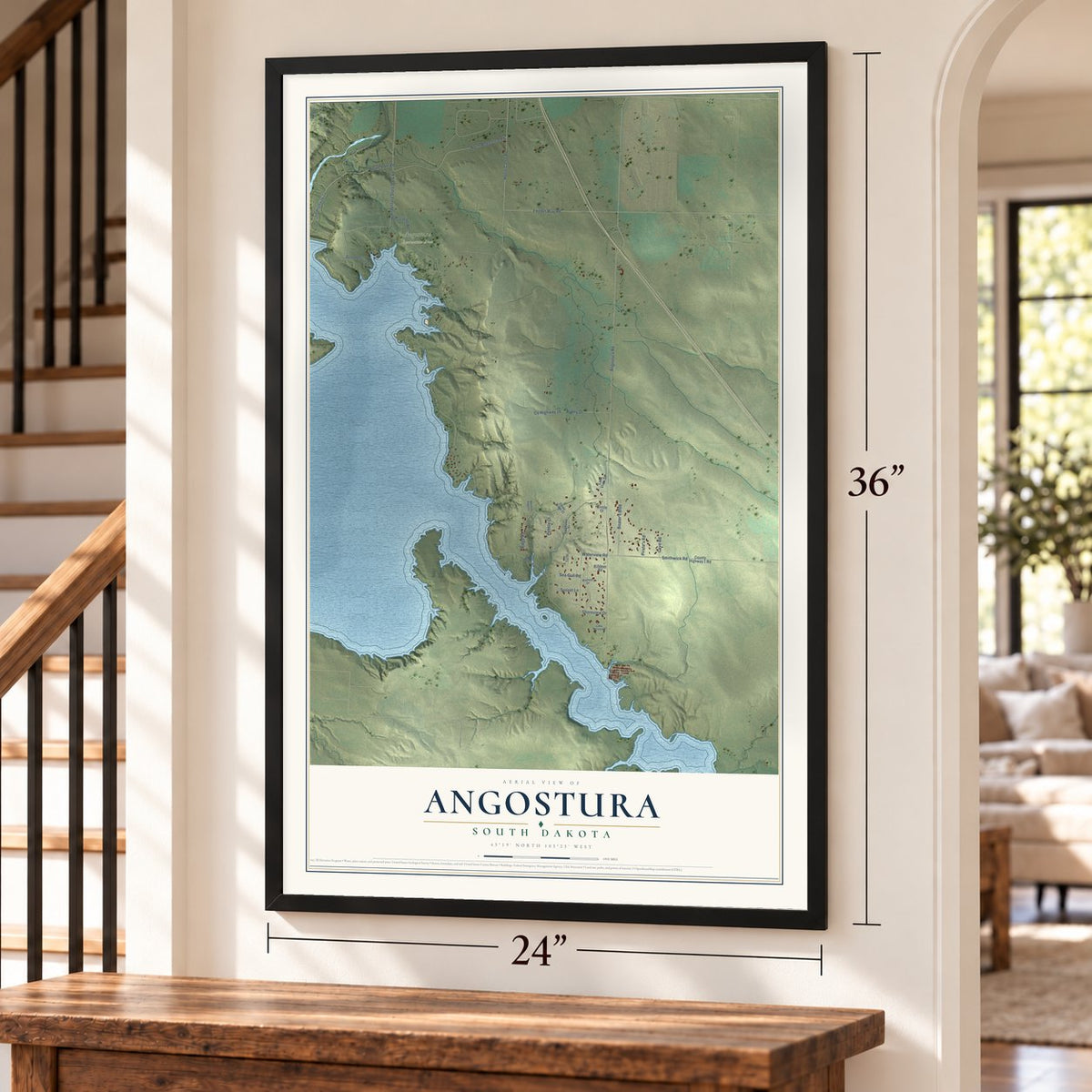 Angostura, South Dakota map, 24 x 36 inch print in a black frame by a staircase