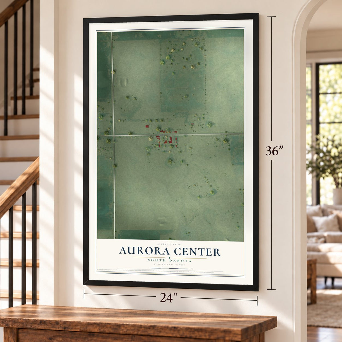 Aurora Center, South Dakota map, 24 x 36 inch print in a black frame by a staircase