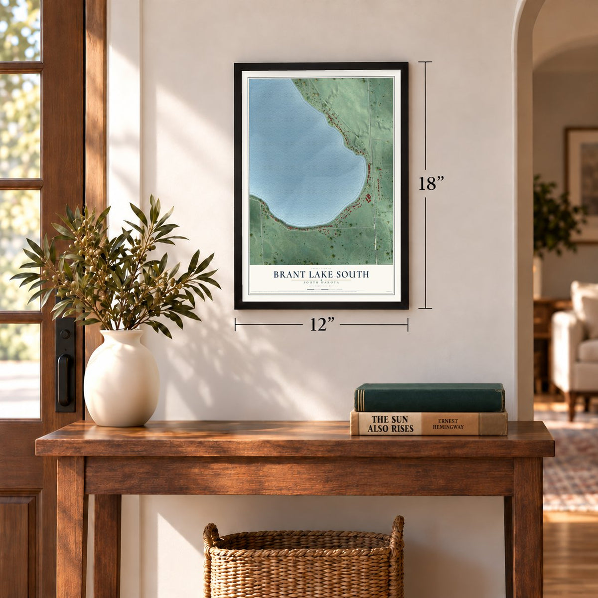 Brant Lake South, South Dakota map, 12 x 18 inch print in a black frame in an entryway