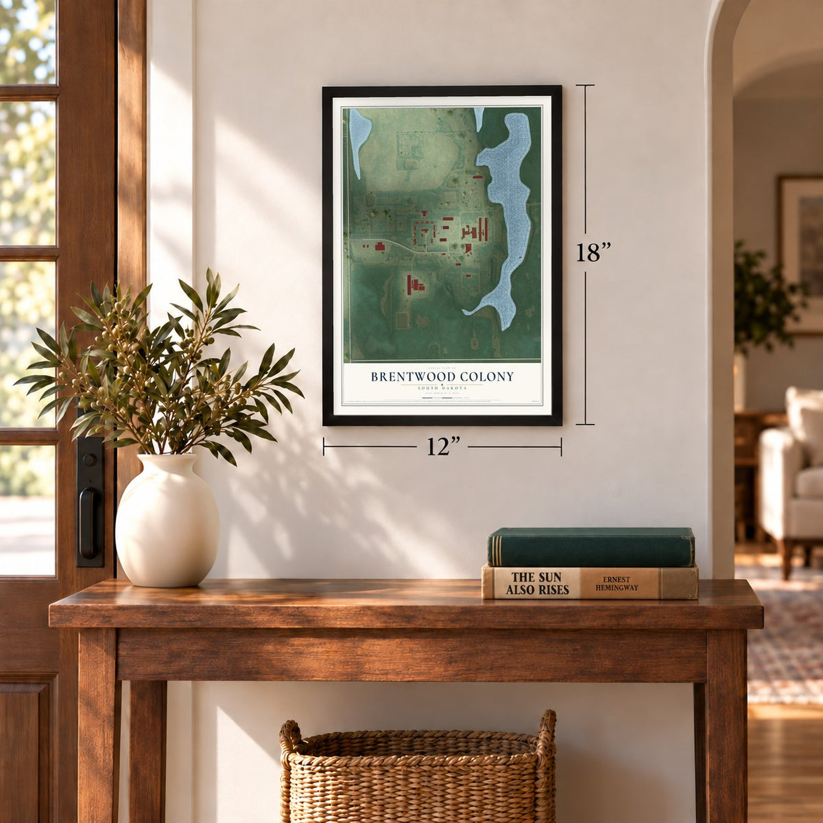 Brentwood Colony, South Dakota map, 12 x 18 inch print in a black frame in an entryway