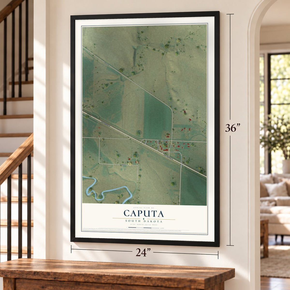 Caputa, South Dakota map, 24 x 36 inch print in a black frame by a staircase