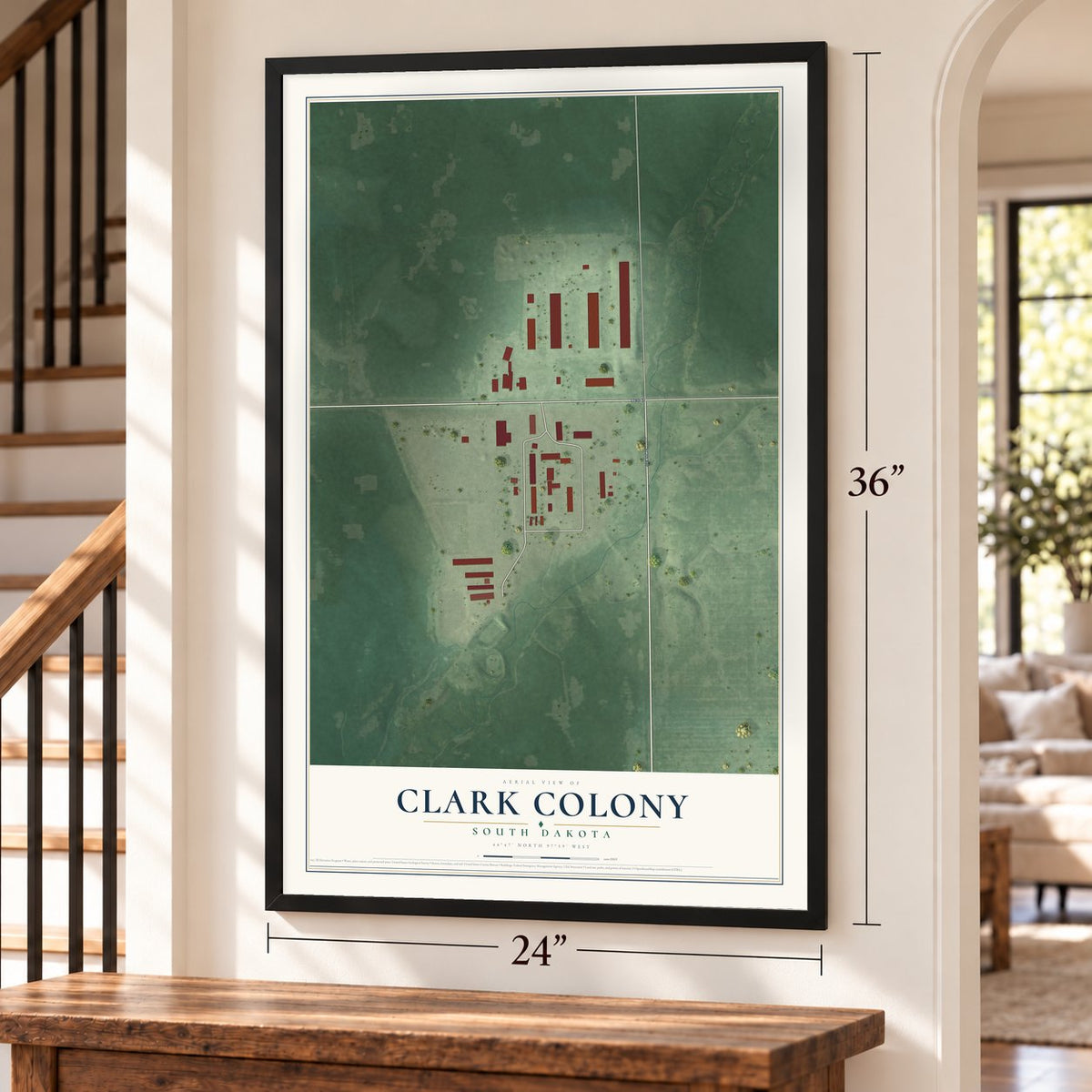 Clark Colony, South Dakota map, 24 x 36 inch print in a black frame by a staircase