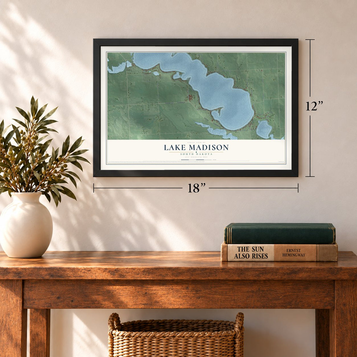 Lake Madison, South Dakota map, 12 x 18 inch print in a black frame in an entryway