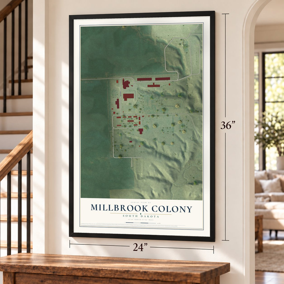 Millbrook Colony, South Dakota map, 24 x 36 inch print in a black frame by a staircase