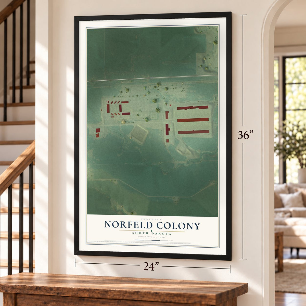 Norfeld Colony, South Dakota map, 24 x 36 inch print in a black frame by a staircase