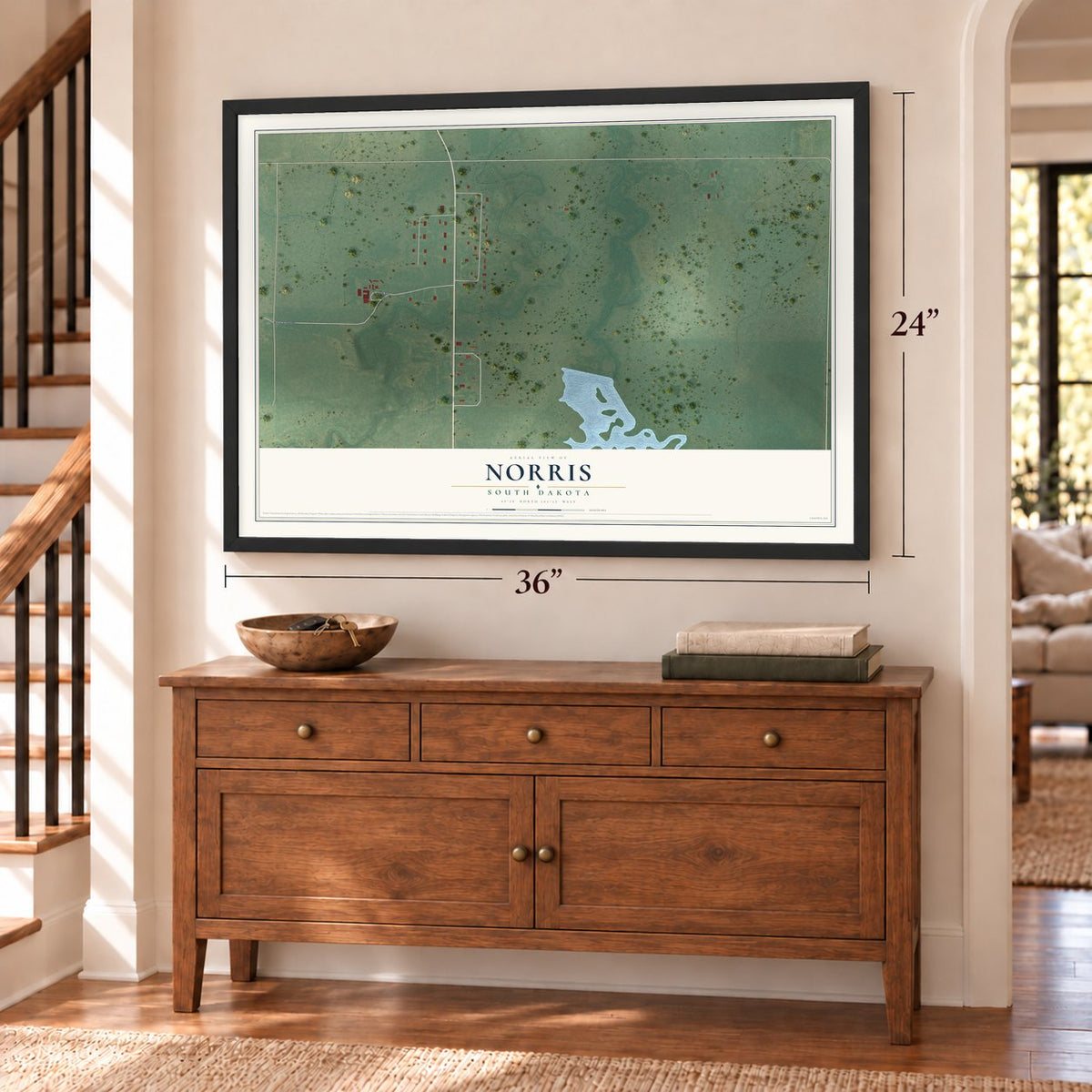 Norris, South Dakota map, 24 x 36 inch print in a black frame above a dresser by a staircase
