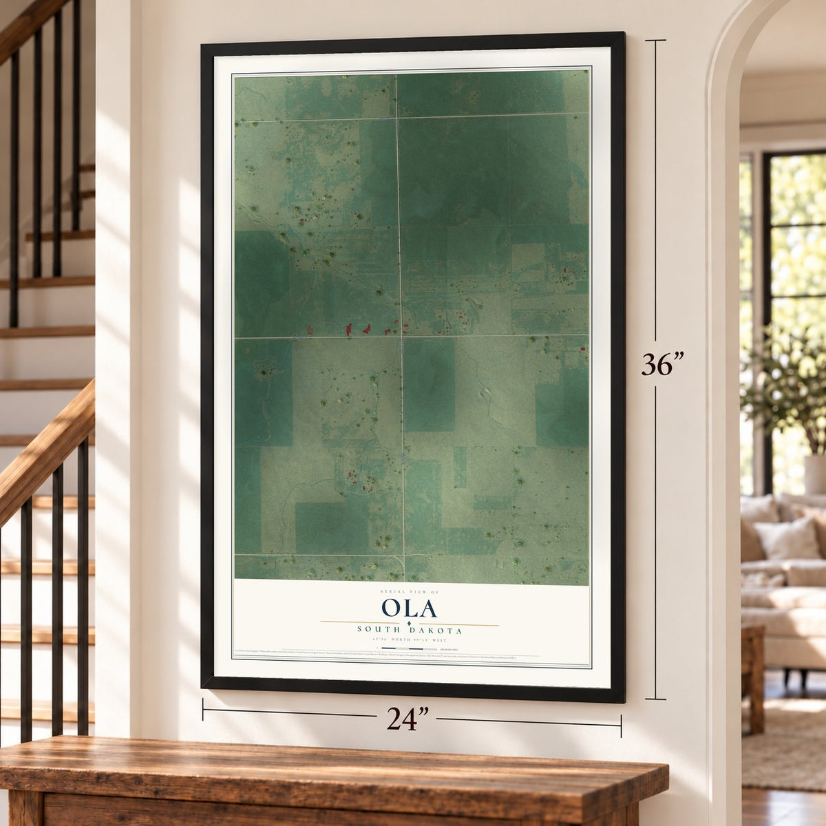 Ola, South Dakota map, 24 x 36 inch print in a black frame by a staircase