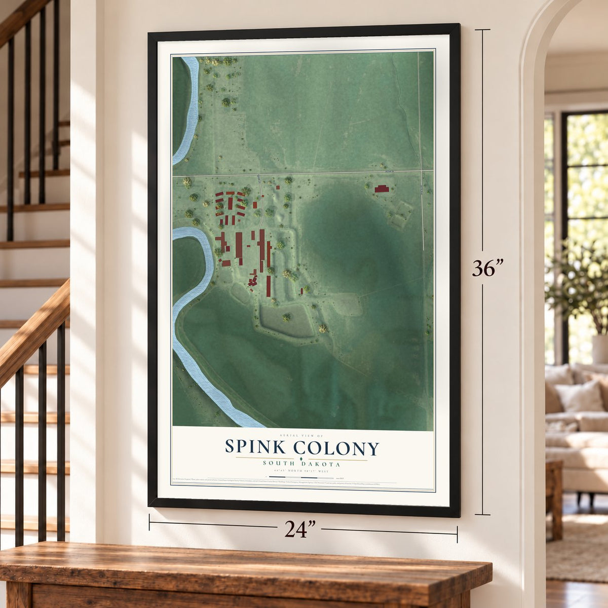 Spink Colony, South Dakota map, 24 x 36 inch print in a black frame by a staircase