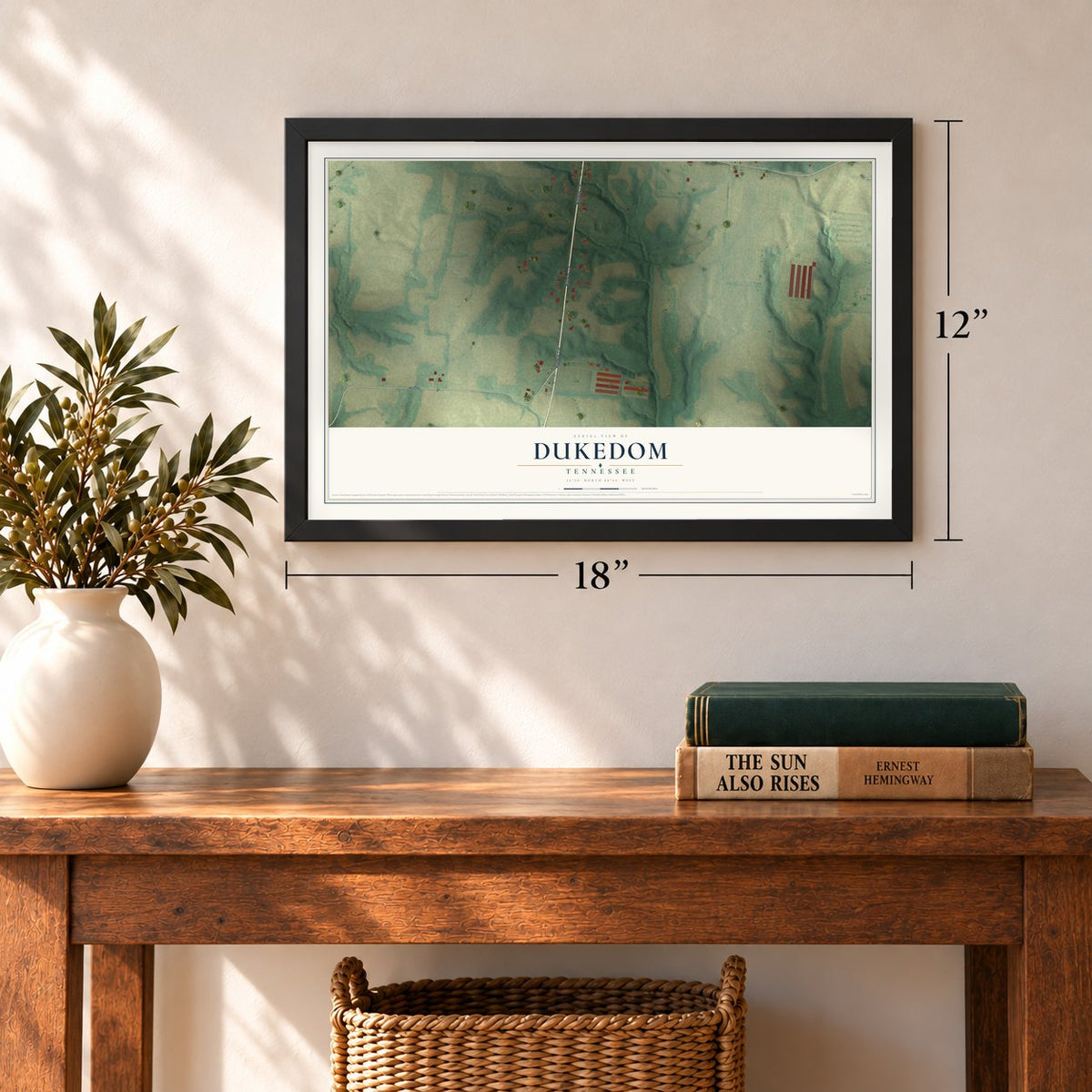 Dukedom, Tennessee map, 12 x 18 inch print in a black frame in an entryway