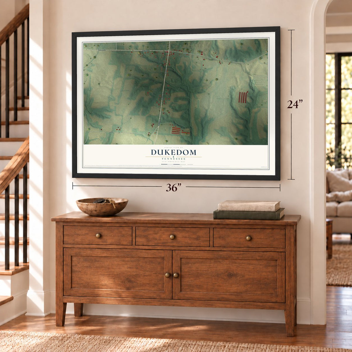 Dukedom, Tennessee map, 24 x 36 inch print in a black frame above a dresser by a staircase