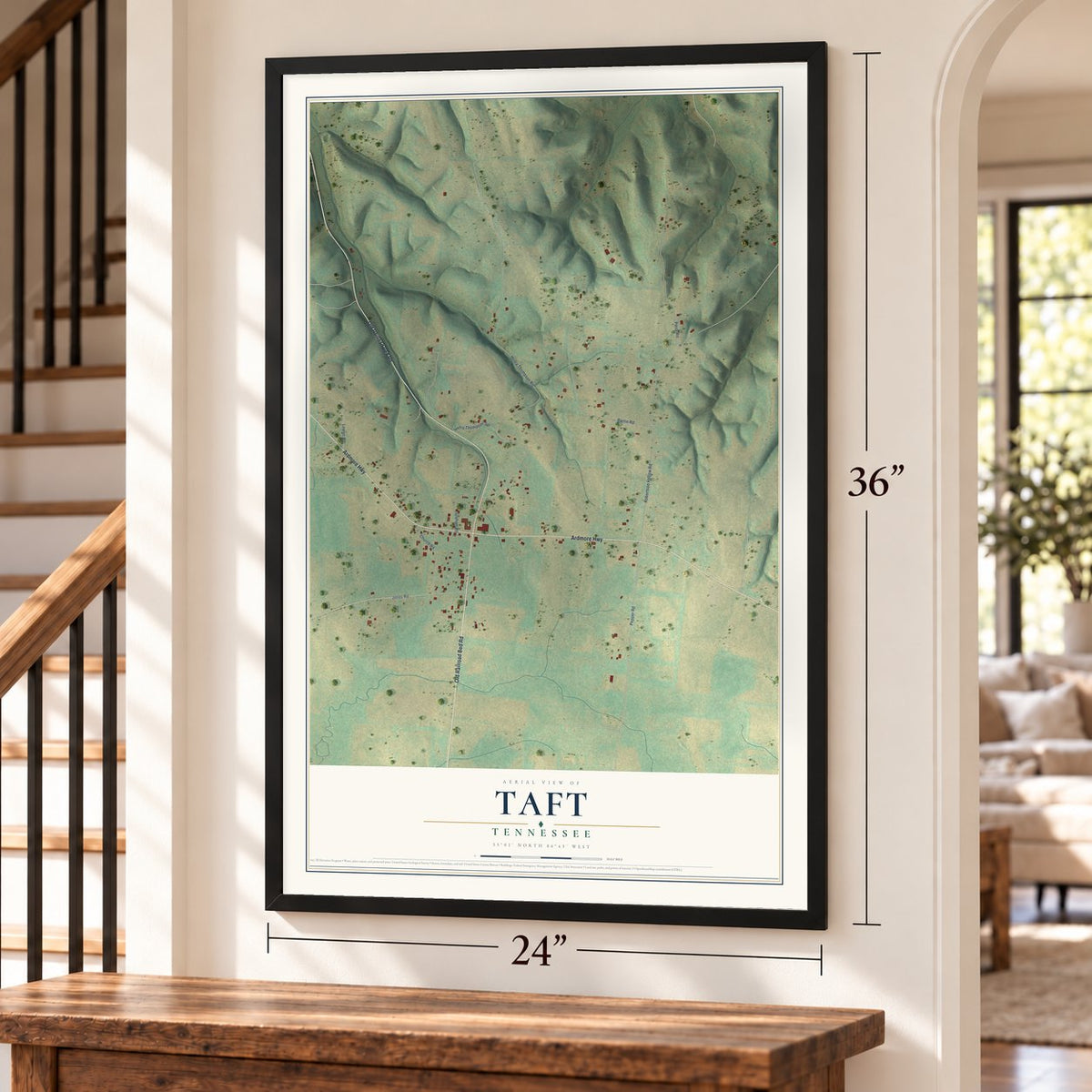 Taft, Tennessee map, 24 x 36 inch print in a black frame by a staircase