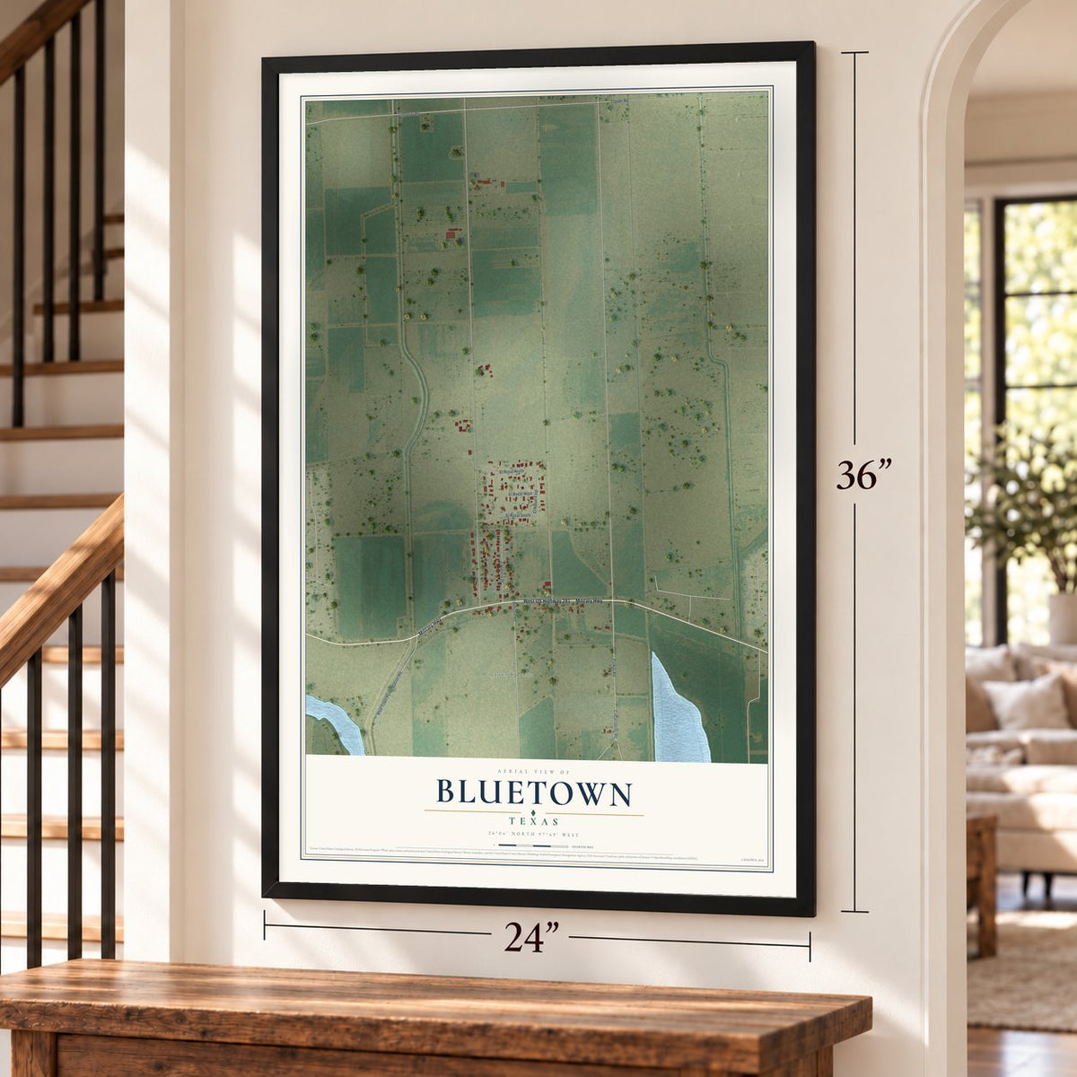 Bluetown, Texas map, 24 x 36 inch print in a black frame by a staircase