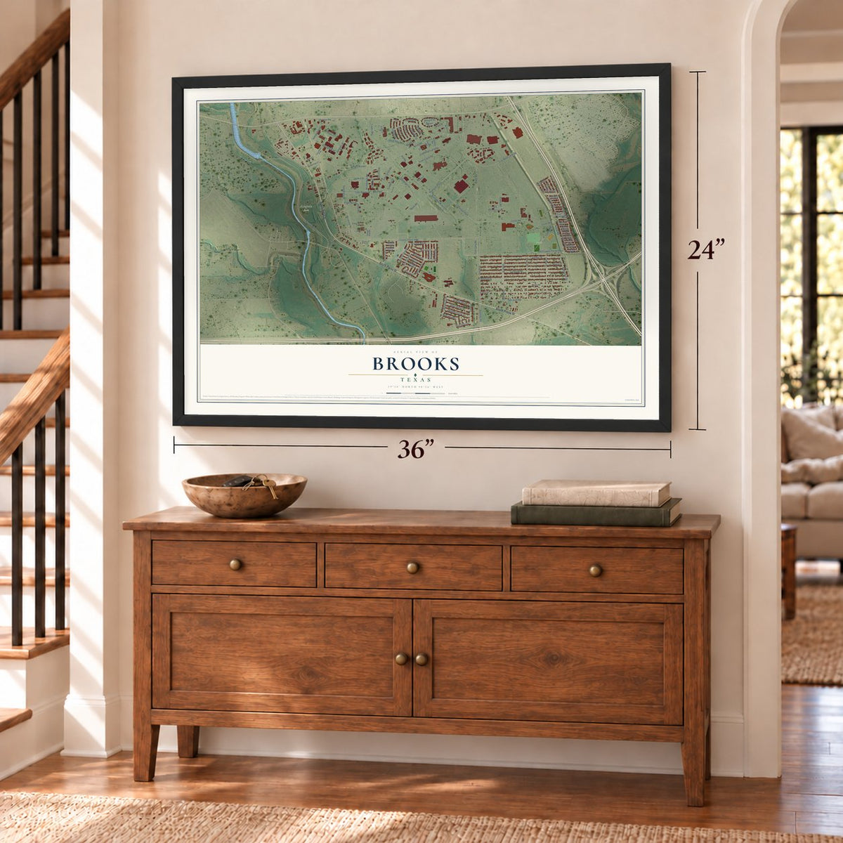Brooks, Texas map, 24 x 36 inch print in a black frame above a dresser by a staircase
