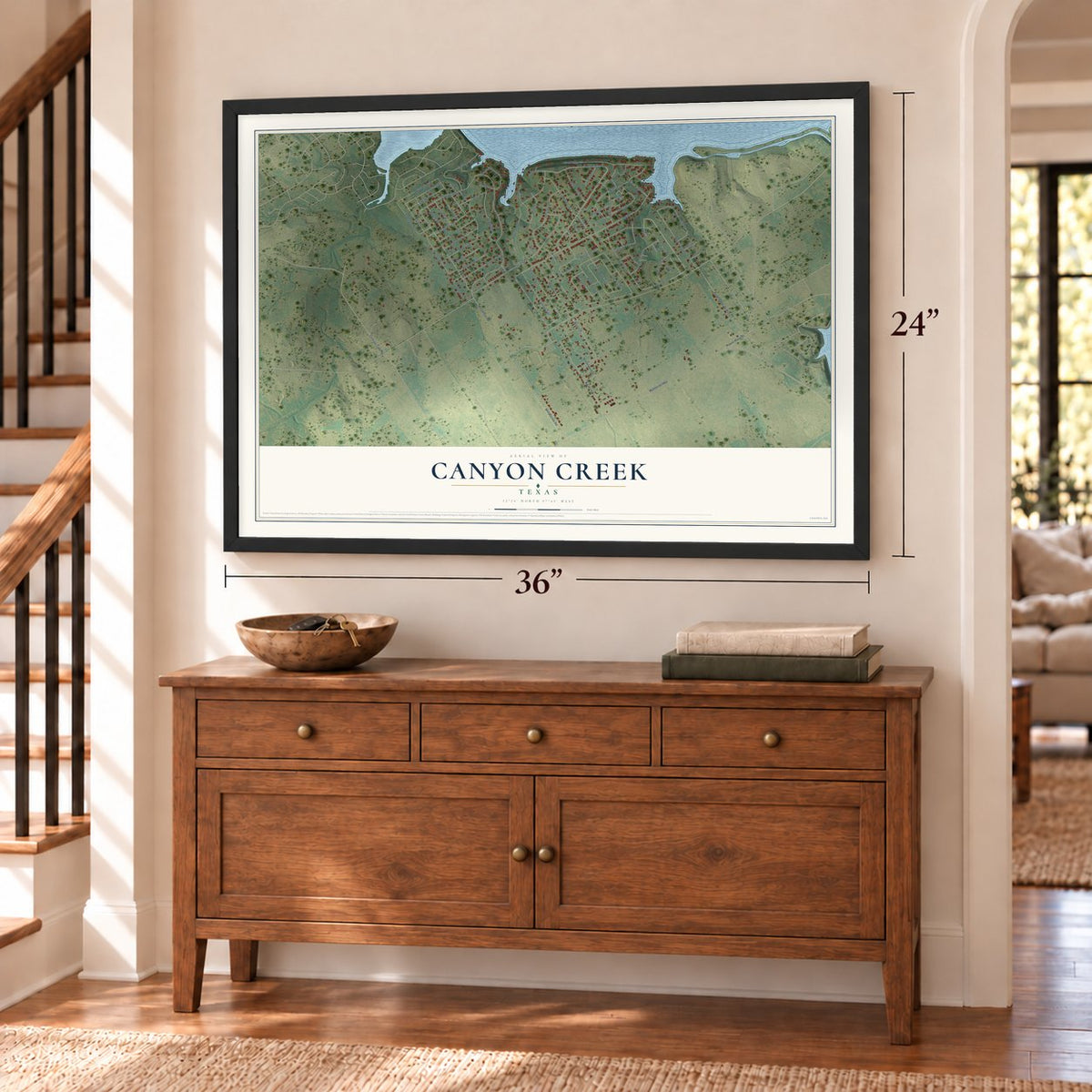 Canyon Creek, Texas map, 24 x 36 inch print in a black frame above a dresser by a staircase