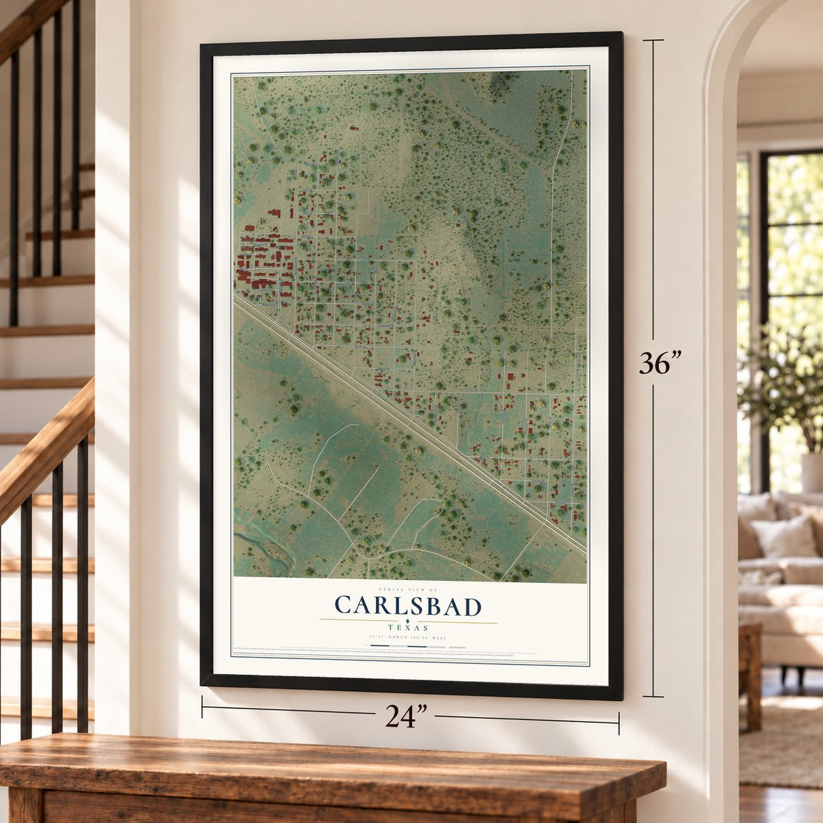Carlsbad, Texas map, 24 x 36 inch print in a black frame by a staircase