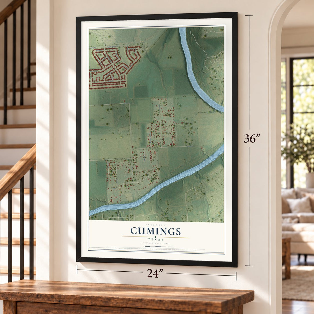 Cumings, Texas map, 24 x 36 inch print in a black frame by a staircase