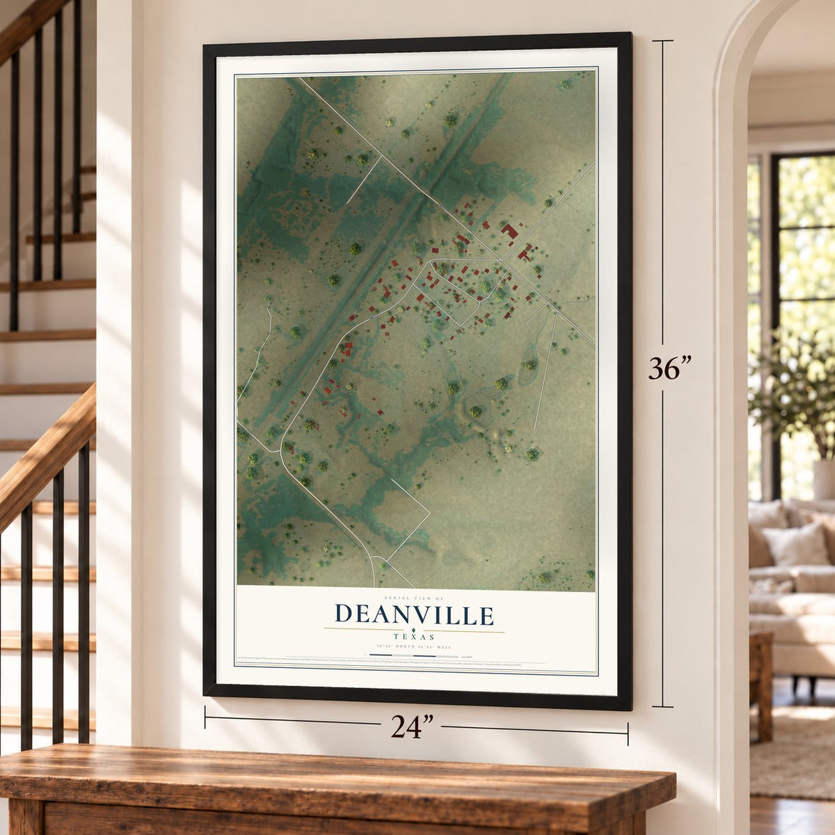 Deanville, Texas map, 24 x 36 inch print in a black frame by a staircase