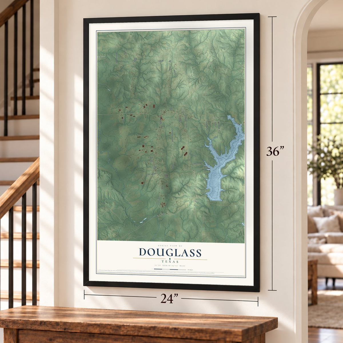 Douglass, Texas map, 24 x 36 inch print in a black frame by a staircase