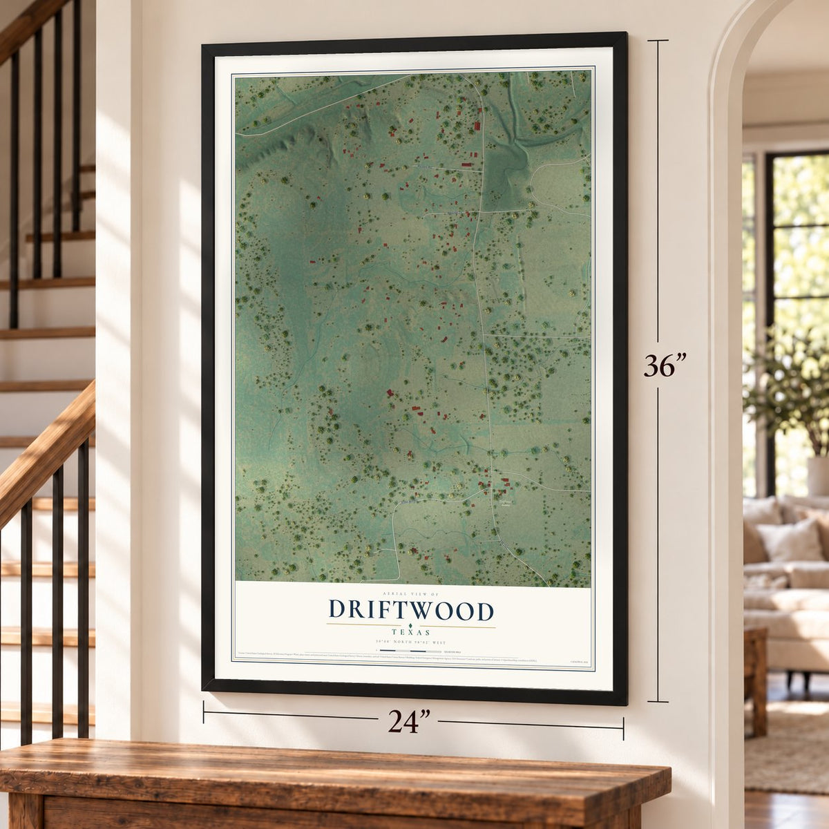 Driftwood, Texas map, 24 x 36 inch print in a black frame by a staircase