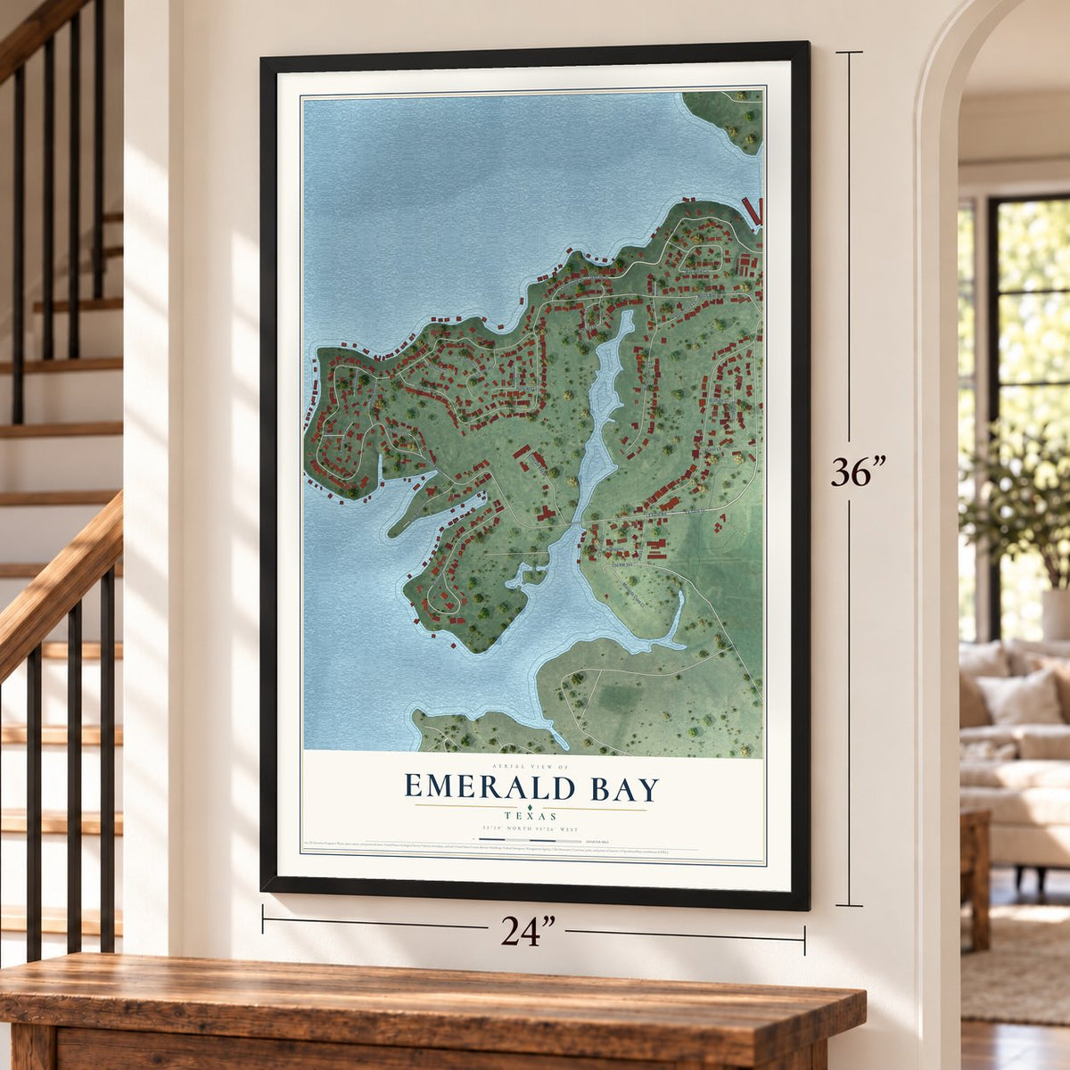 Emerald Bay, Texas map, 24 x 36 inch print in a black frame by a staircase