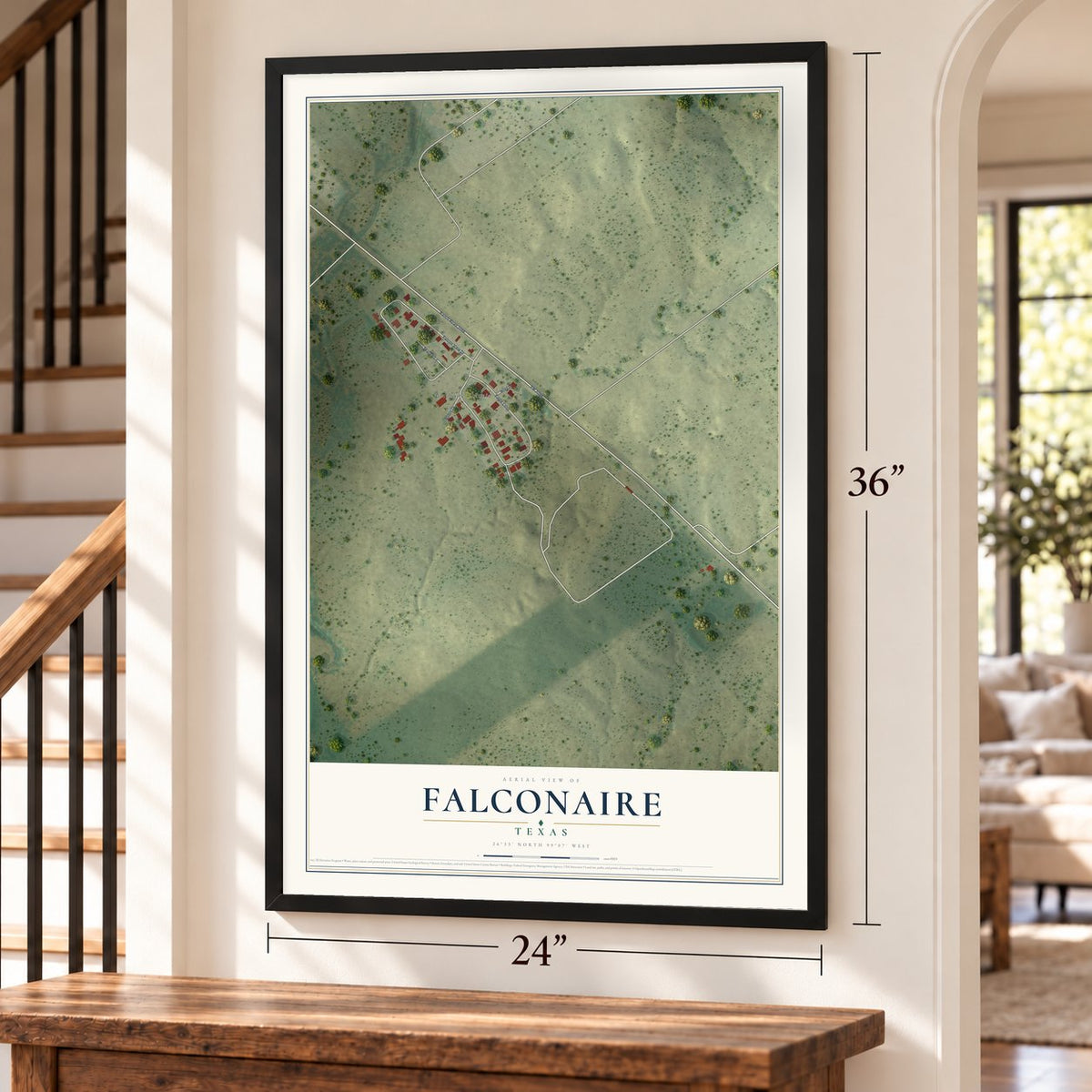 Falconaire, Texas map, 24 x 36 inch print in a black frame by a staircase