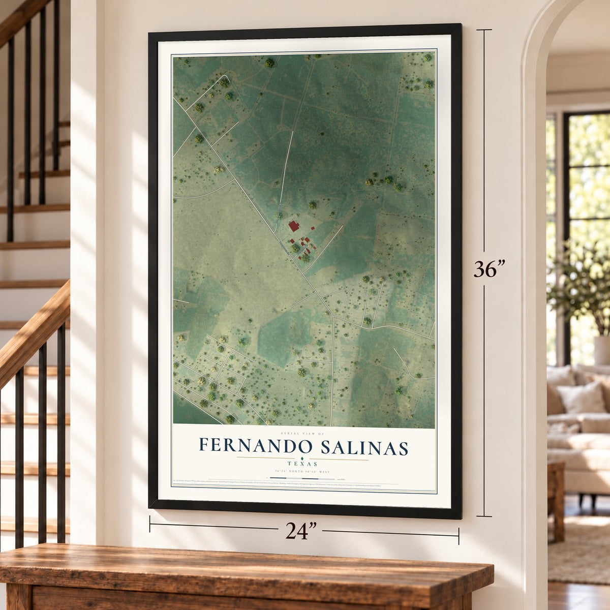 Fernando Salinas, Texas map, 24 x 36 inch print in a black frame by a staircase