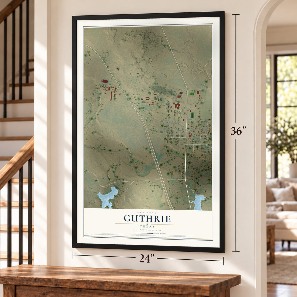 Guthrie, Texas map, 24 x 36 inch print in a black frame by a staircase