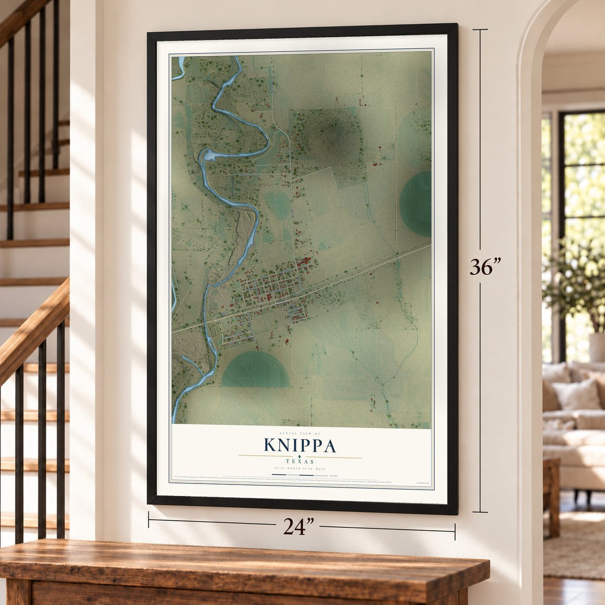 Knippa, Texas map, 24 x 36 inch print in a black frame by a staircase