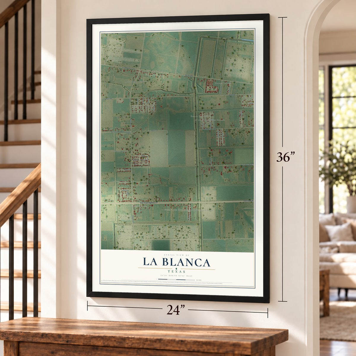 La Blanca, Texas map, 24 x 36 inch print in a black frame by a staircase