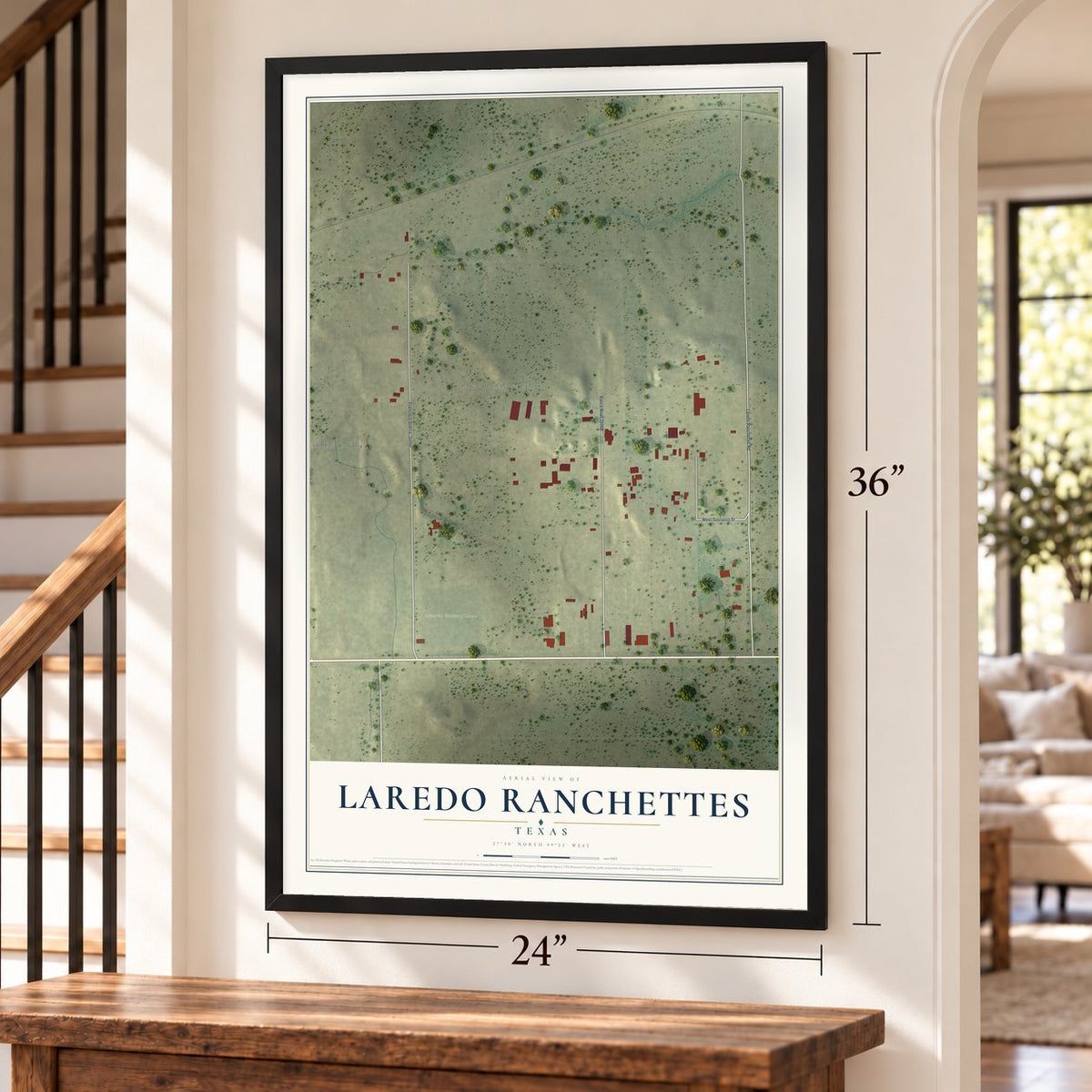 Laredo Ranchettes, Texas map, 24 x 36 inch print in a black frame by a staircase