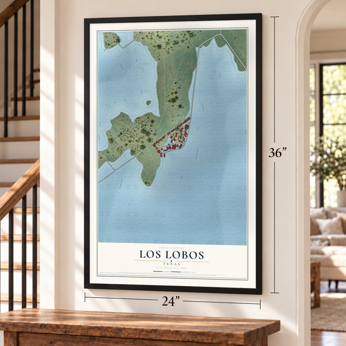 Los Lobos, Texas map, 24 x 36 inch print in a black frame by a staircase