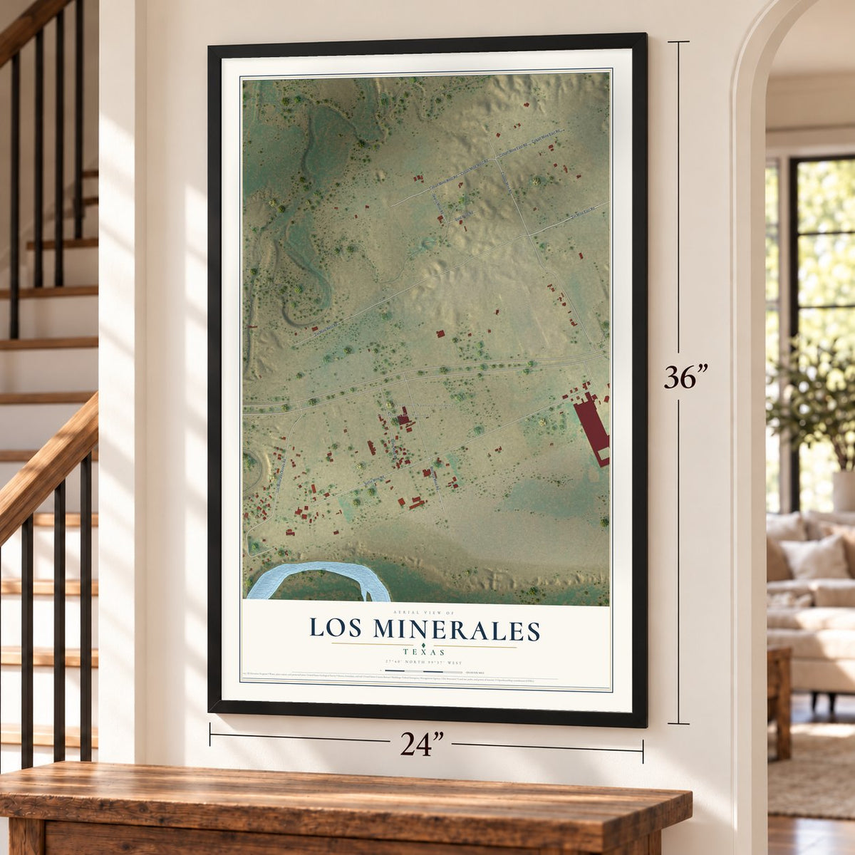 Los Minerales, Texas map, 24 x 36 inch print in a black frame by a staircase