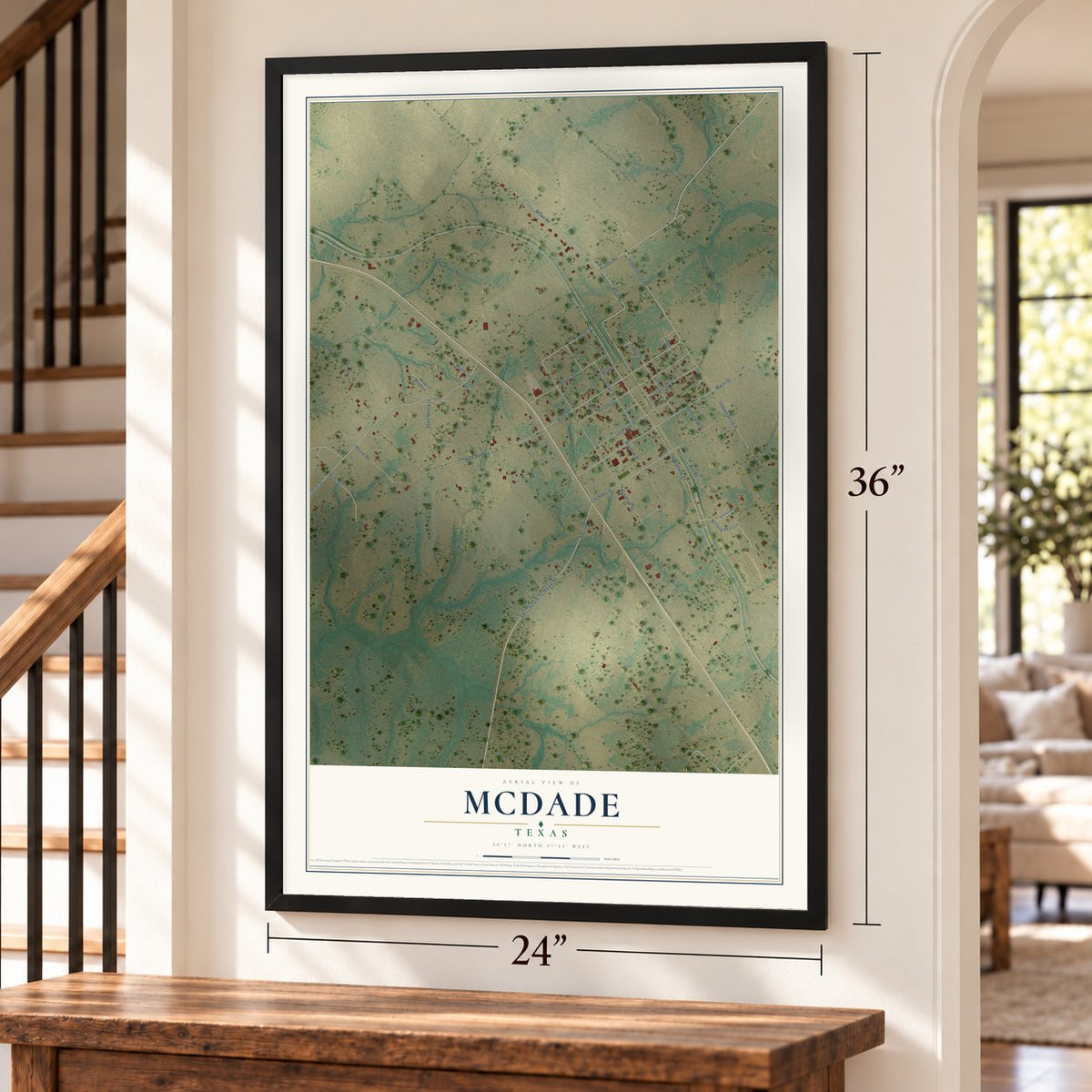 McDade, Texas map, 24 x 36 inch print in a black frame by a staircase