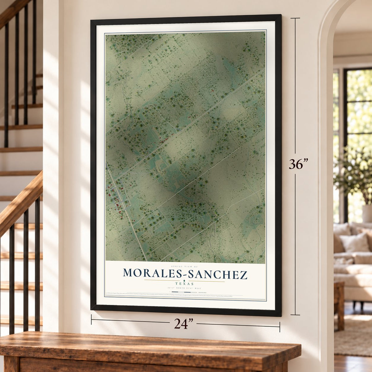 Morales-Sanchez, Texas map, 24 x 36 inch print in a black frame by a staircase