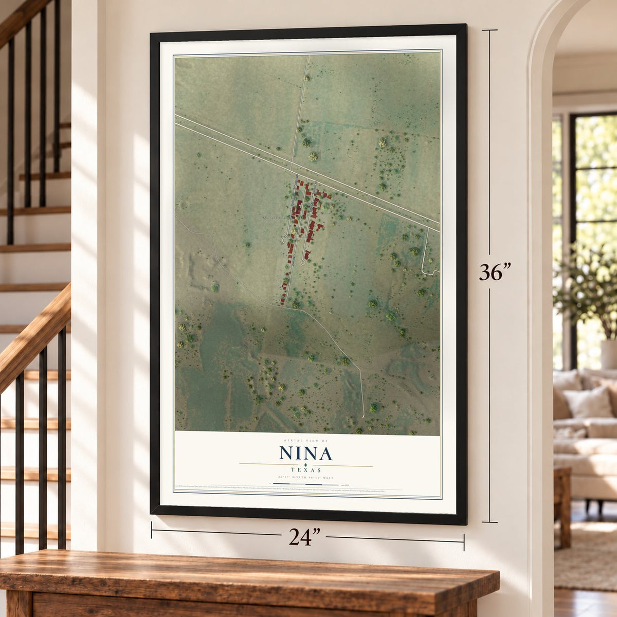 Nina, Texas map, 24 x 36 inch print in a black frame by a staircase