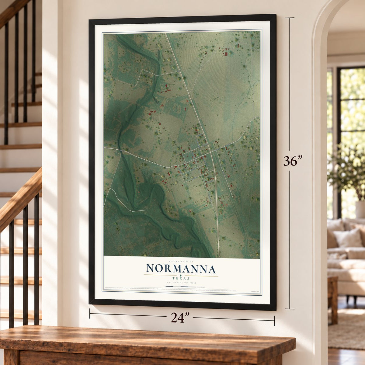 Normanna, Texas map, 24 x 36 inch print in a black frame by a staircase