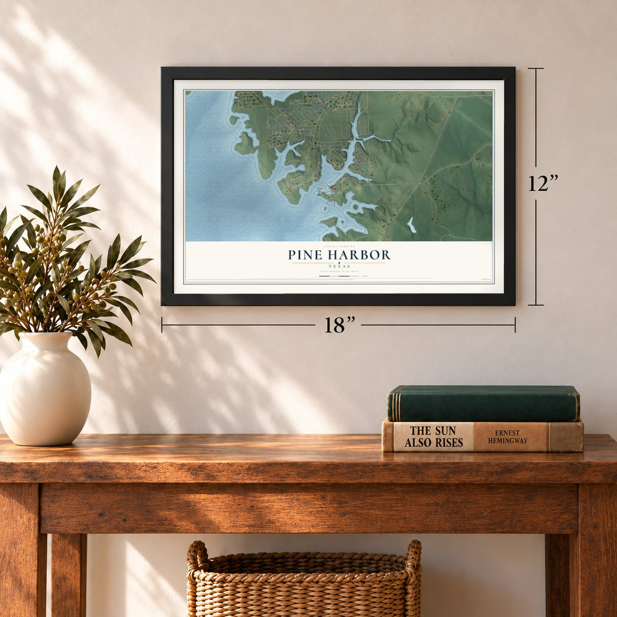 Pine Harbor, Texas map, 12 x 18 inch print in a black frame in an entryway