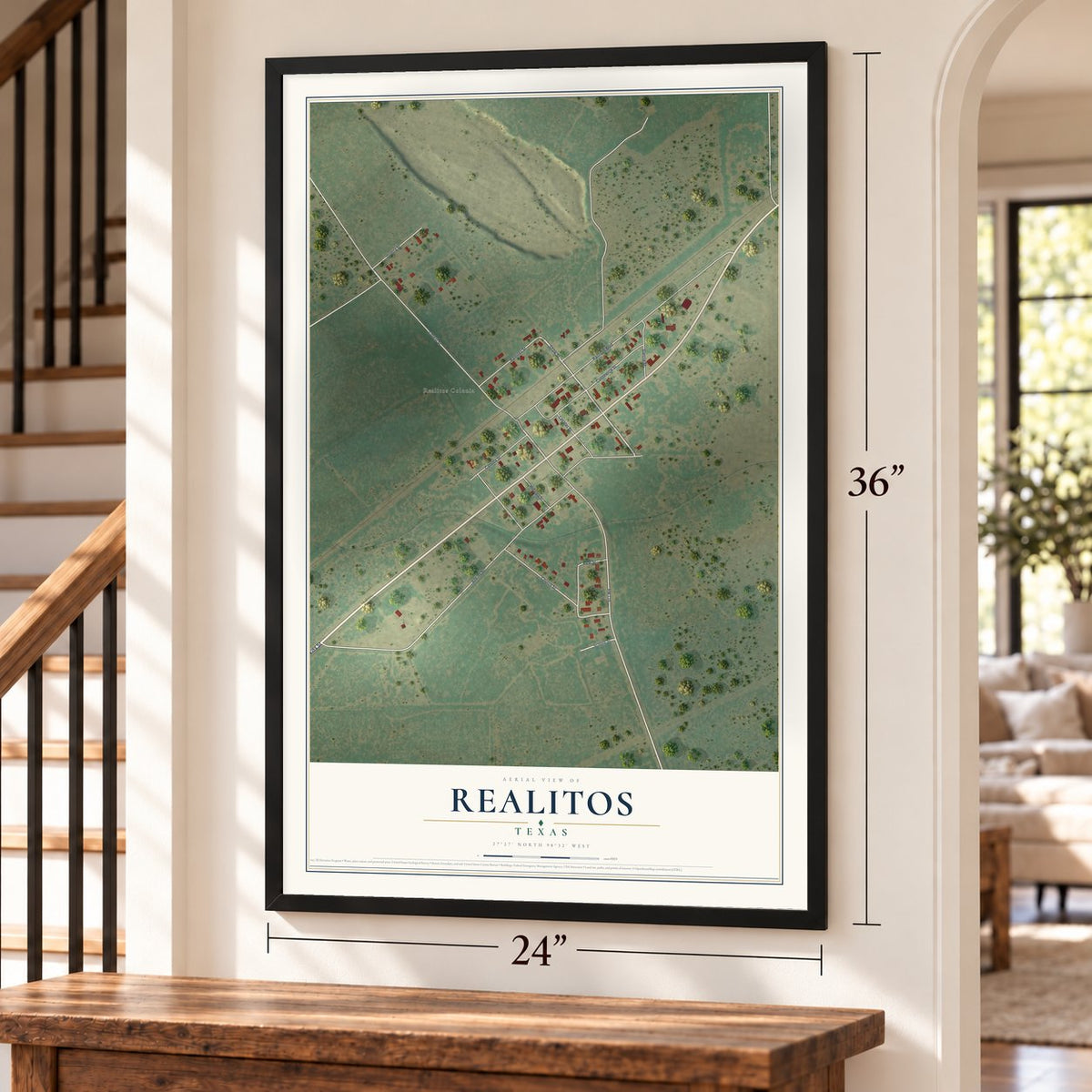 Realitos, Texas map, 24 x 36 inch print in a black frame by a staircase