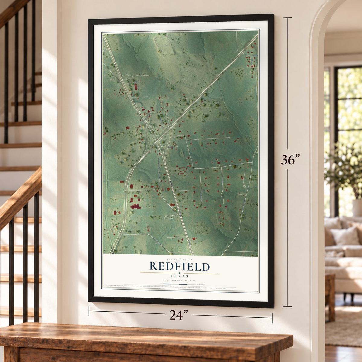 Redfield, Texas map, 24 x 36 inch print in a black frame by a staircase