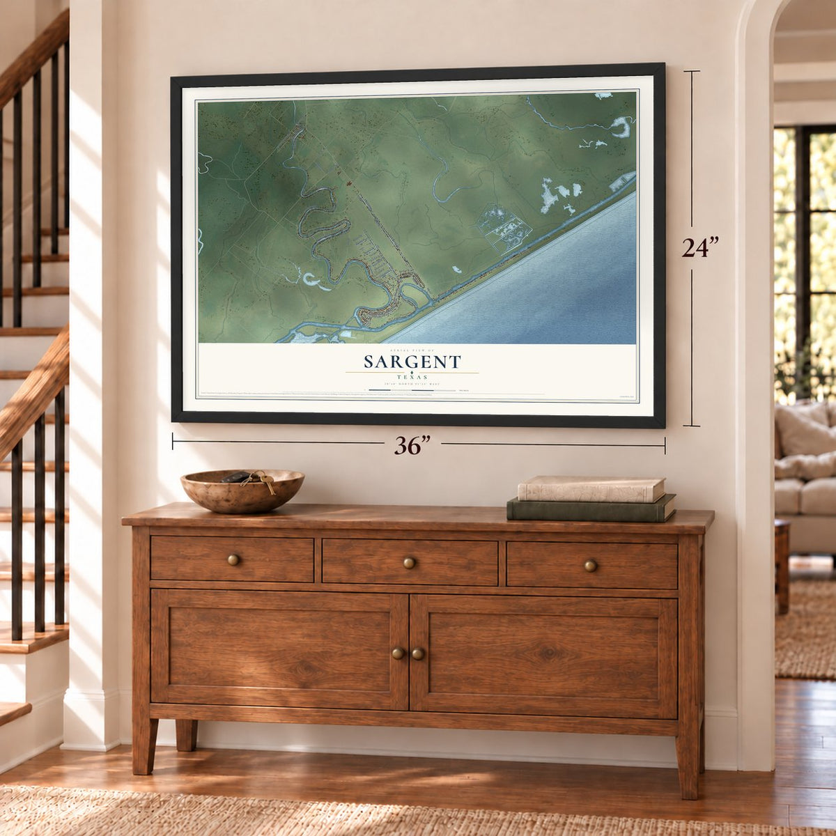 Sargent, Texas map, 24 x 36 inch print in a black frame above a dresser by a staircase