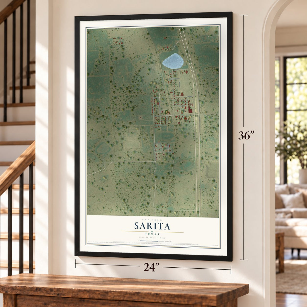 Sarita, Texas map, 24 x 36 inch print in a black frame by a staircase
