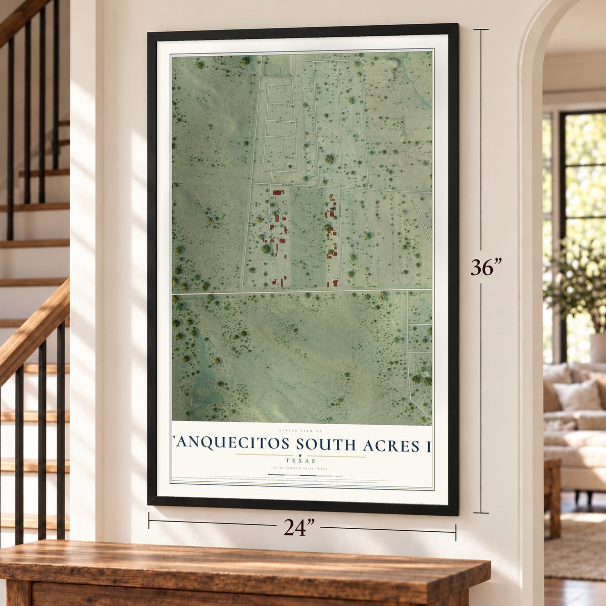 Tanquecitos South Acres II, Texas map, 24 x 36 inch print in a black frame by a staircase