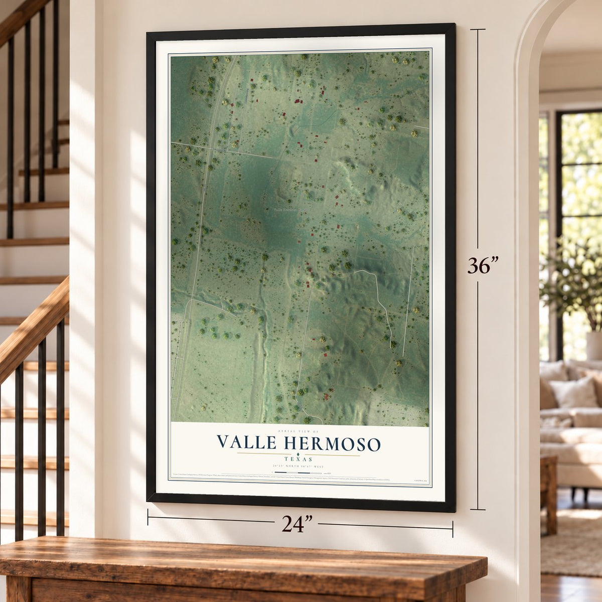 Valle Hermoso, Texas map, 24 x 36 inch print in a black frame by a staircase
