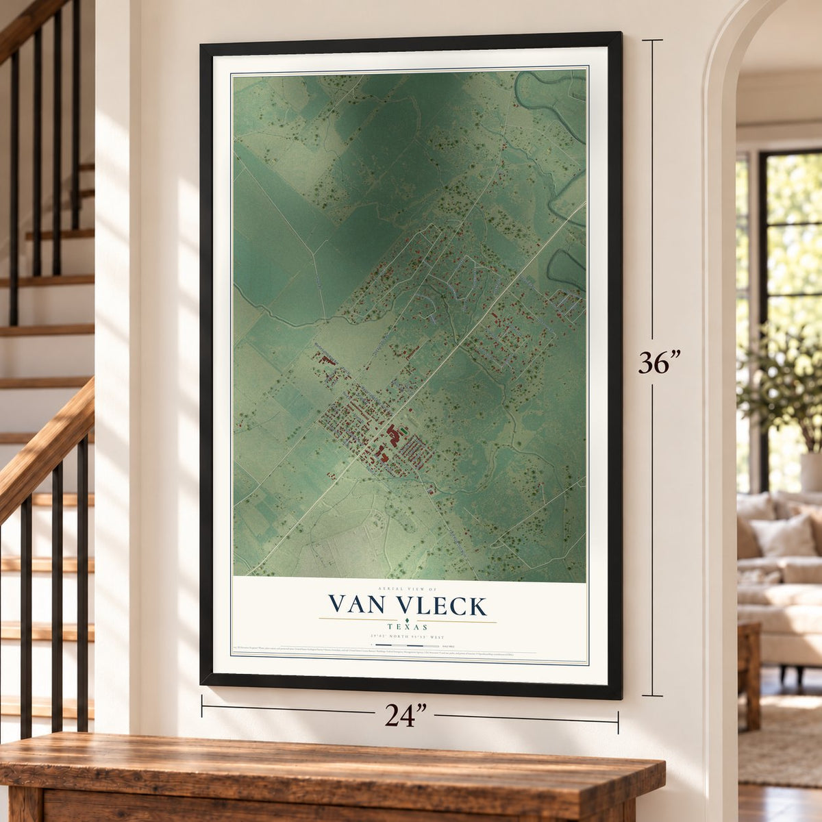 Van Vleck, Texas map, 24 x 36 inch print in a black frame by a staircase