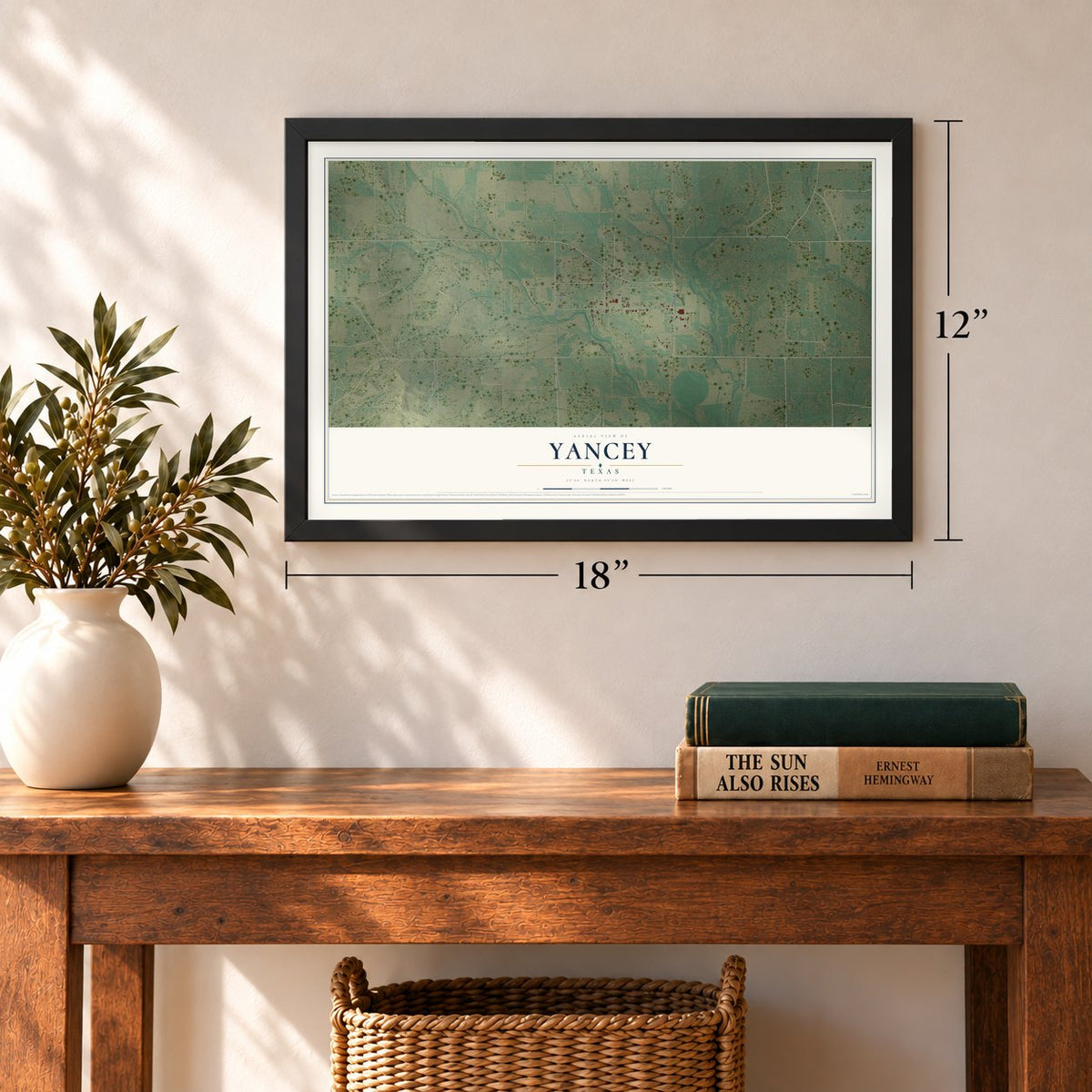 Yancey, Texas map, 12 x 18 inch print in a black frame in an entryway