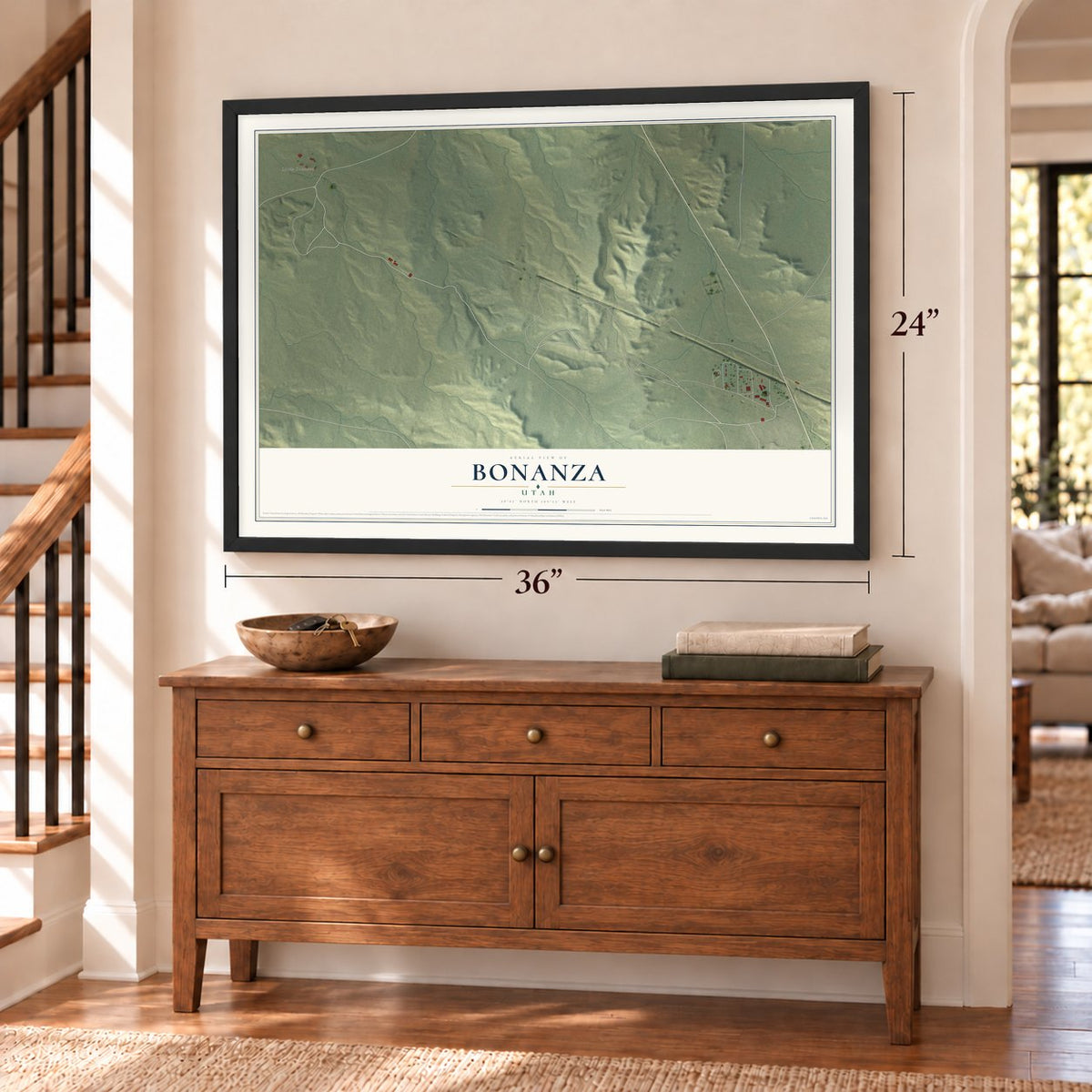 Bonanza, Utah map, 24 x 36 inch print in a black frame above a dresser by a staircase