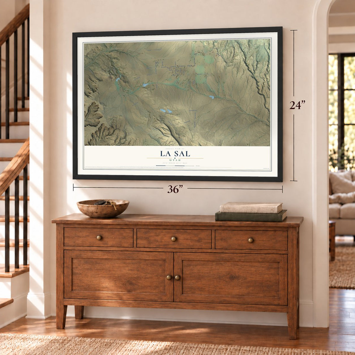 La Sal, Utah map, 24 x 36 inch print in a black frame above a dresser by a staircase